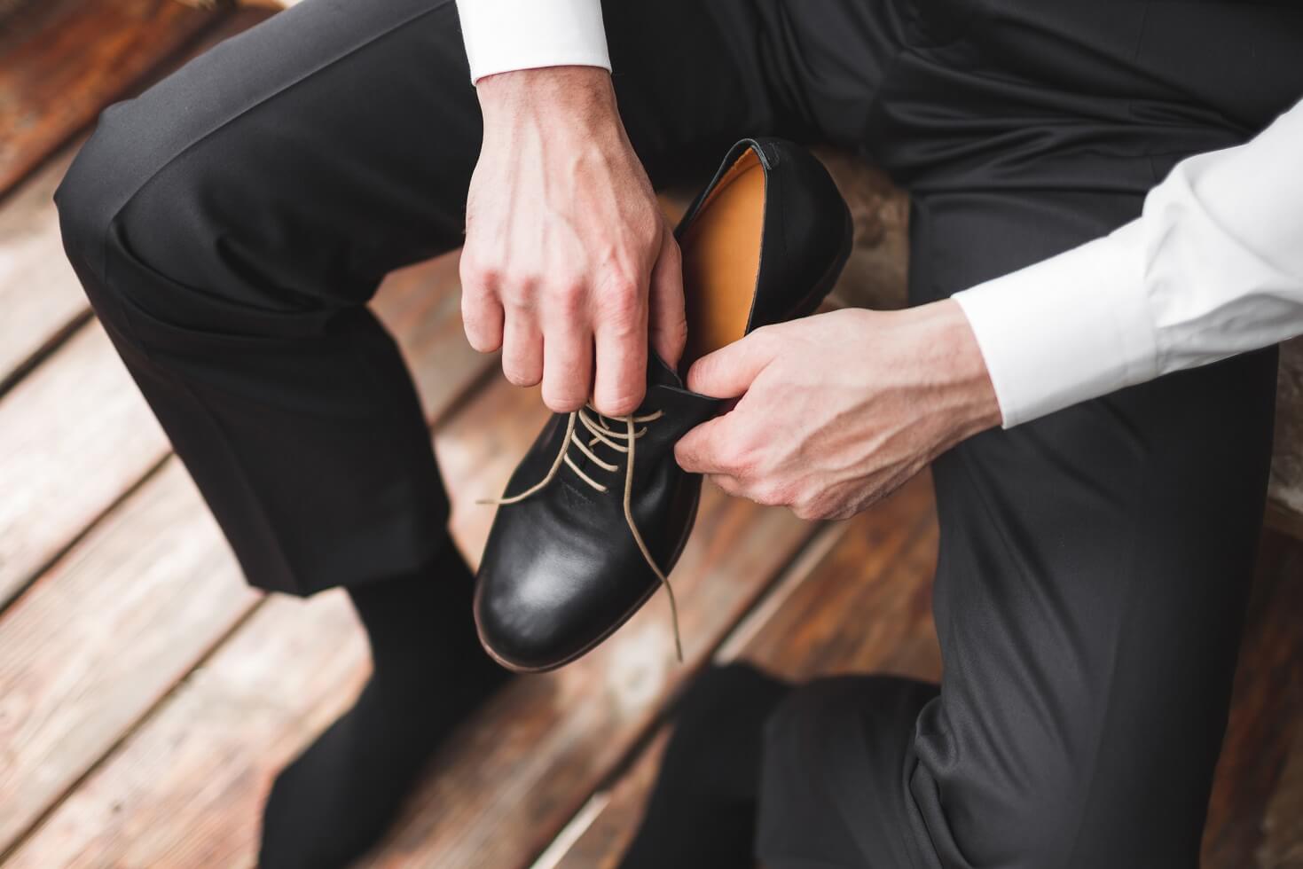 man-wearing-brown-leather-classic-shoes-black-trou-JQLYVJF.jpg